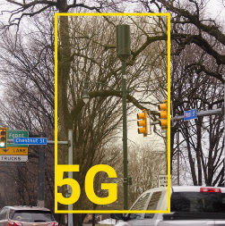 5G tower highlighted by graphic in intersection