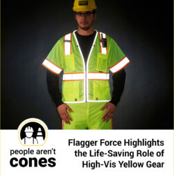 A Flagger Force employee wearing full-body, reflective high-visibility yellow gear.