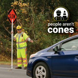 People Aren't Cones - Flagger in yellow PPE