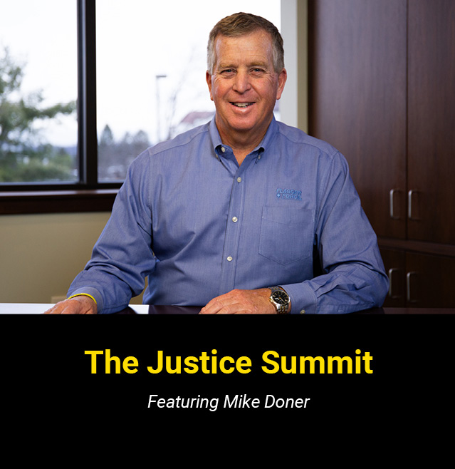 Mike Doner sitting at his desk with the text overlay "The Justice Summit".